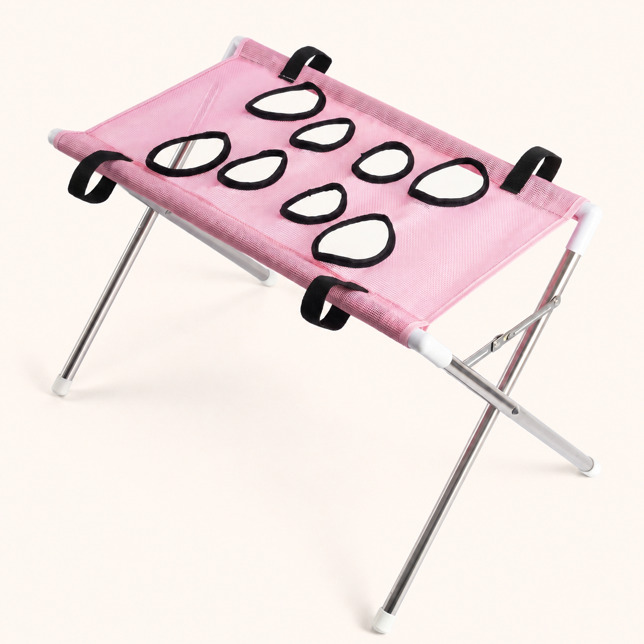 PupCradle dog bathing hammock in Pink on the warm cream website background